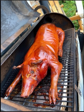 Whole hog roast over open flame
