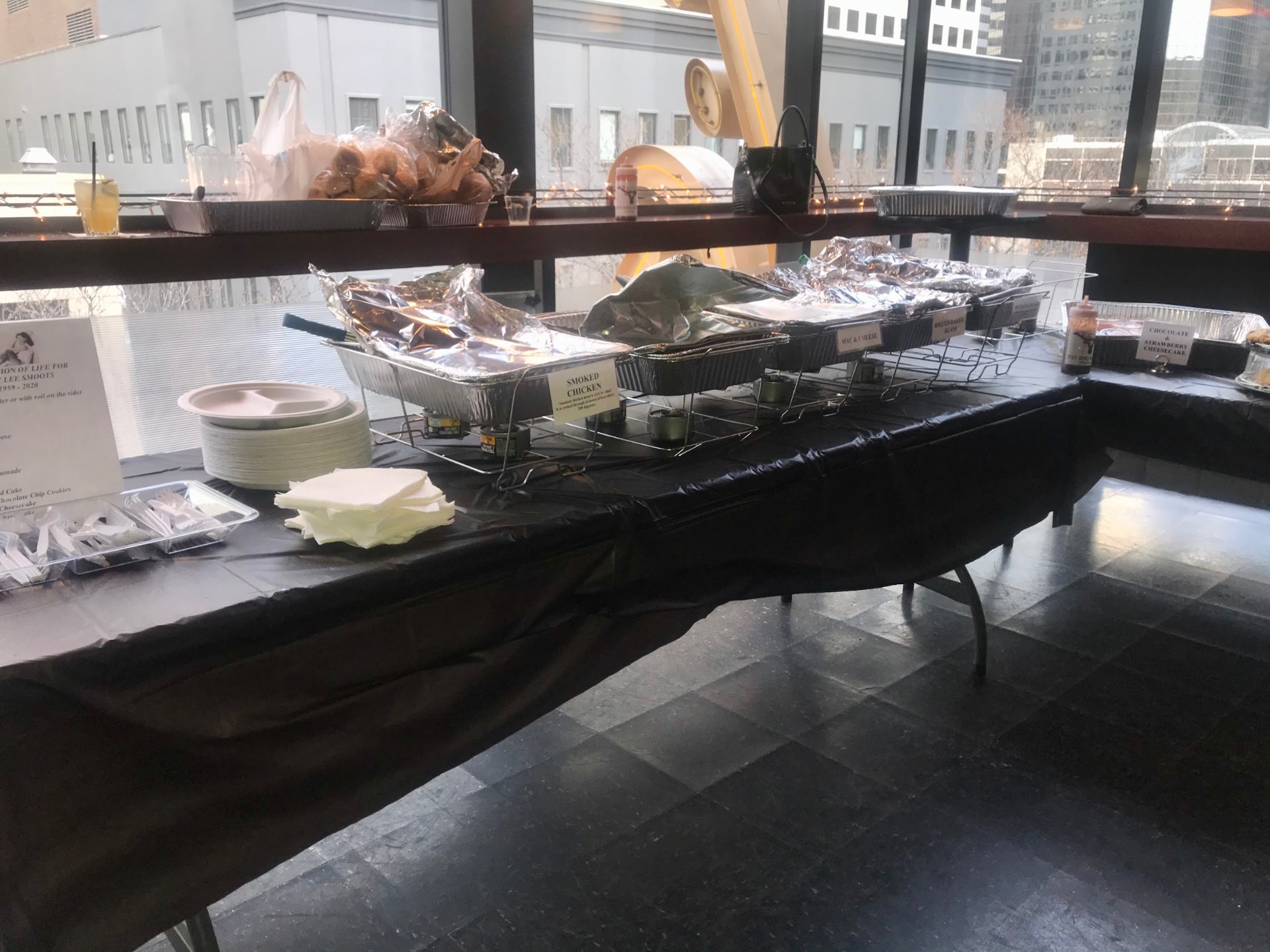 Full buffet setup with smoked chicken, mac & cheese, barbecue beans and desserts