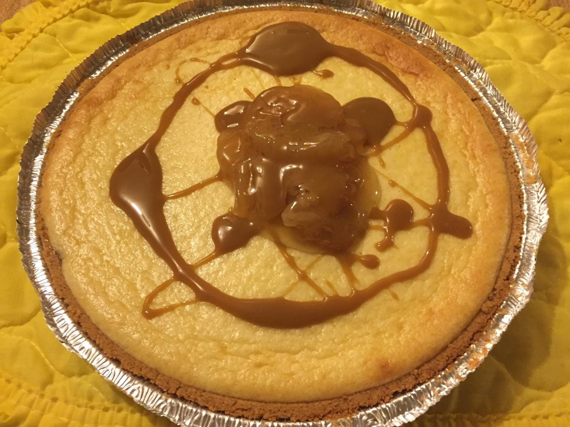 House-made caramel apple cheesecake drizzled with warm caramel