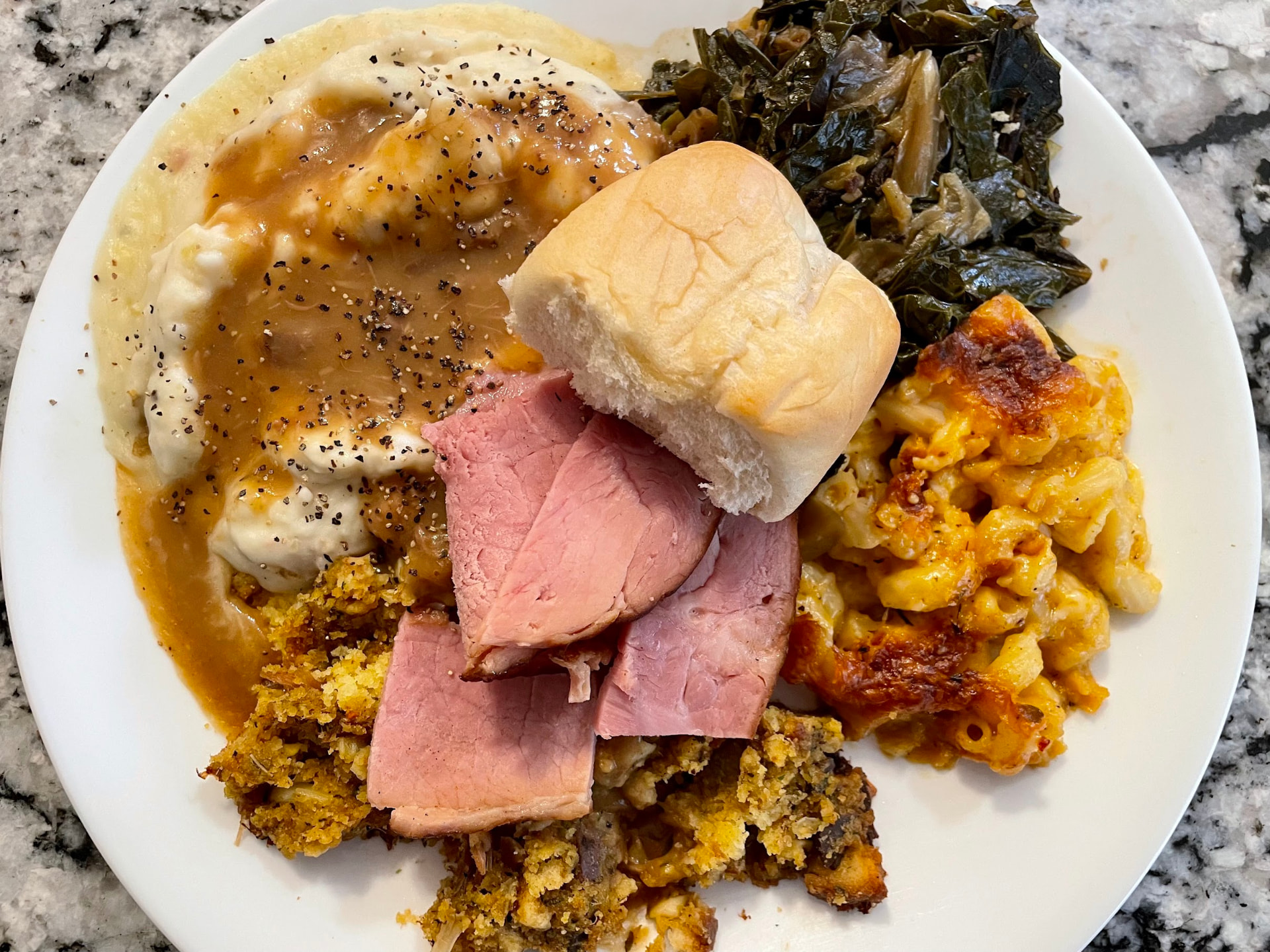 Example holiday meal plate with sliced turkey, sides, and dessert