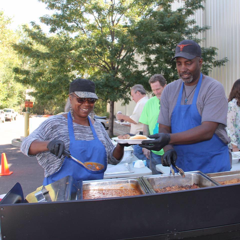 Bruce & May Serving food at a Corporate, Catered event